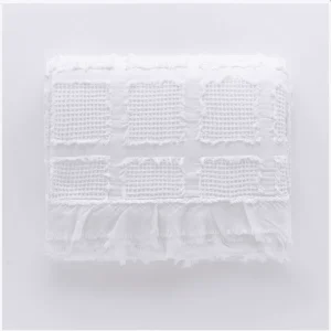 Copriletto waffle stone washed 100% cotone.  doppia rousches – decoro a quadroni.