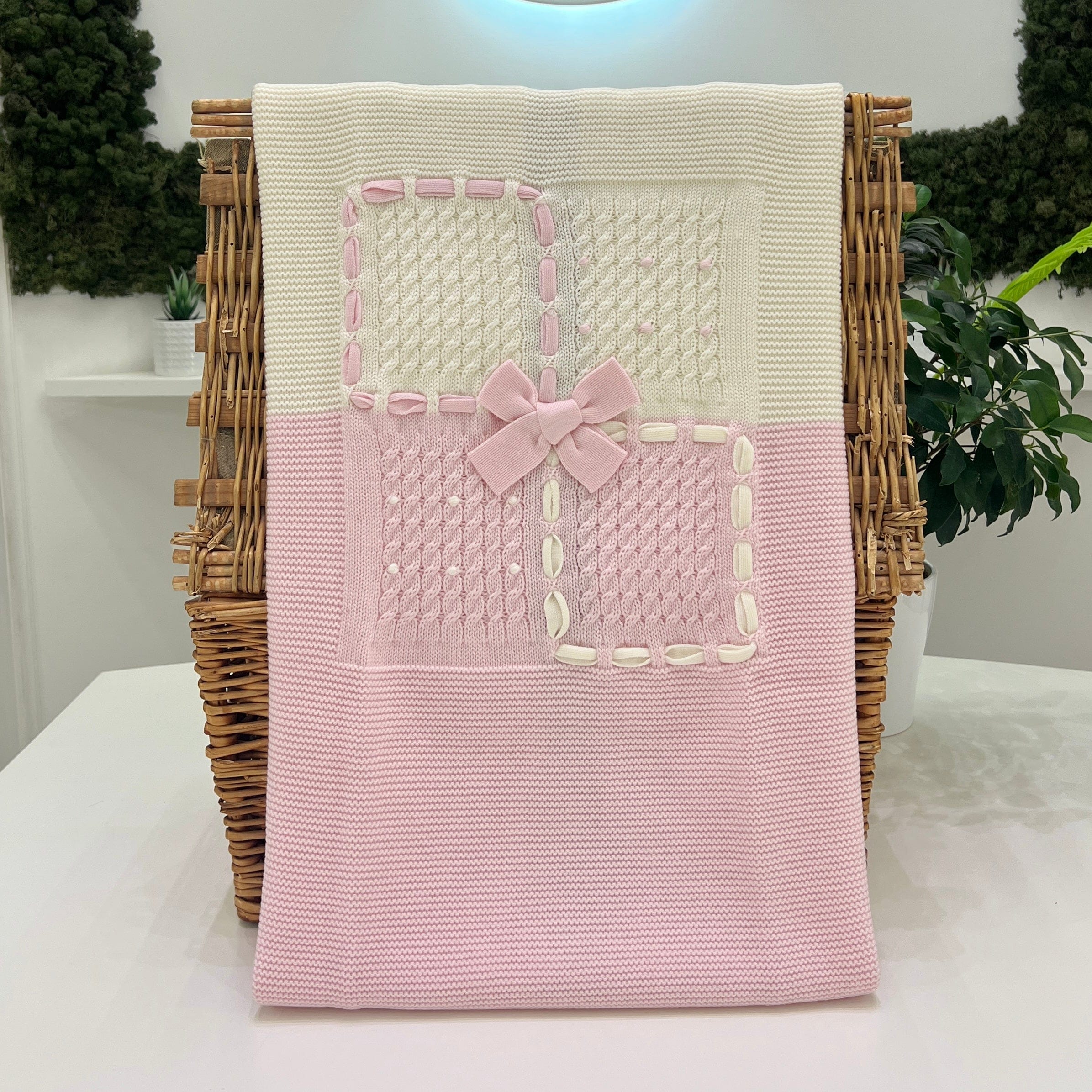 Coperta bicolore fiocco rosa